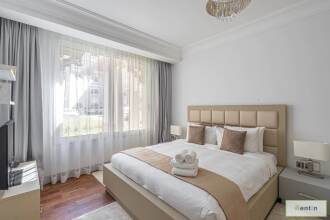 Luxurious 1BR in Palms with Private Beach Access