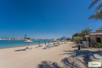 Luxurious 1BR in Palms with Private Beach Access