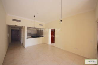 Large 1BR for rent in Canal Residences, Sport City.